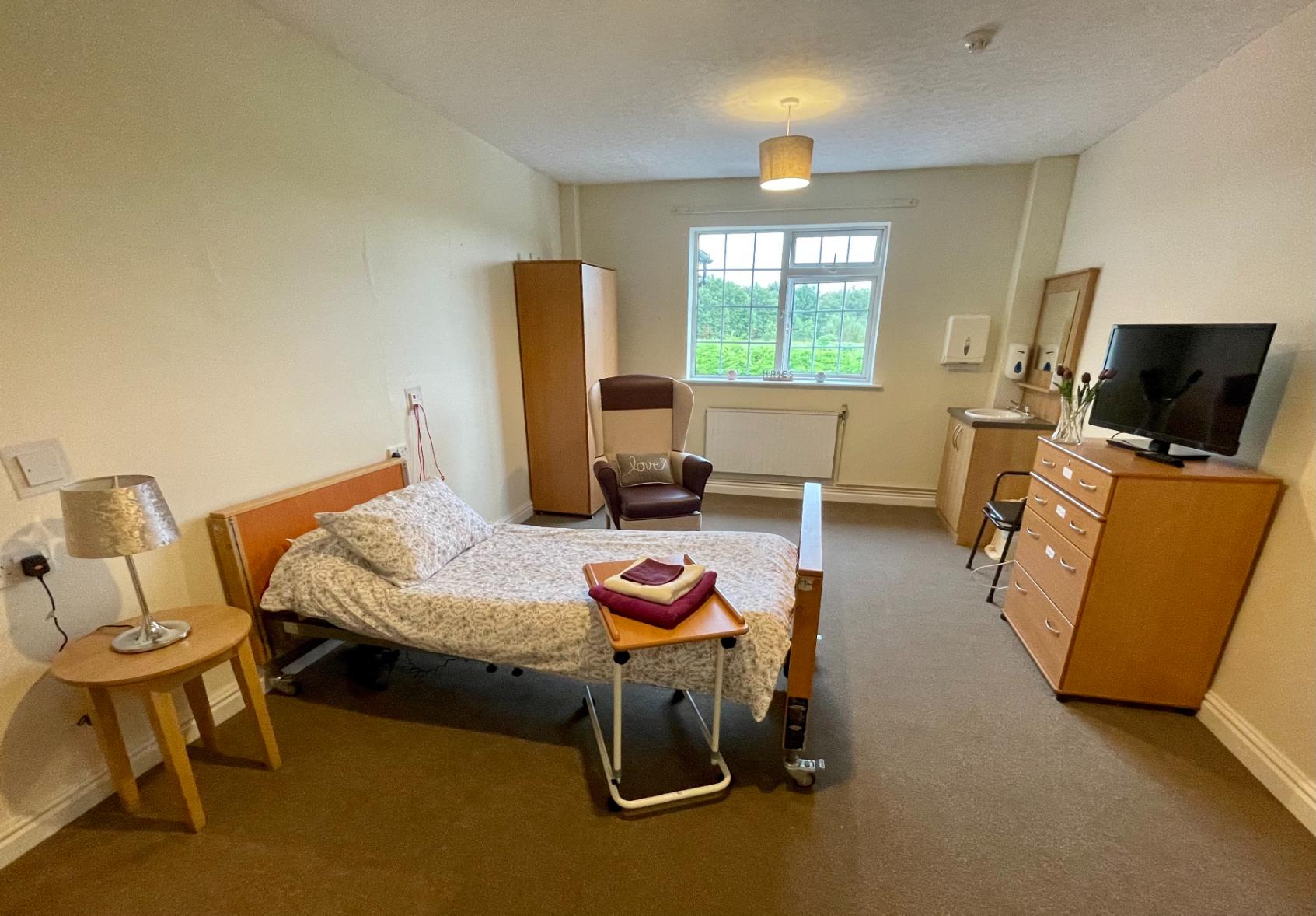 spacious care home bedroom